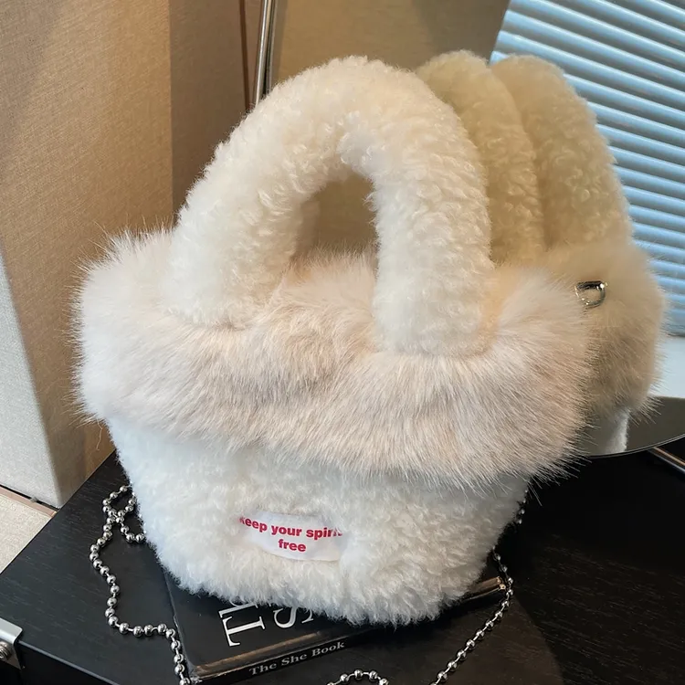 冬季爆款毛茸茸包包女2025新款百搭斜挎毛毛包独特小众手提水桶包