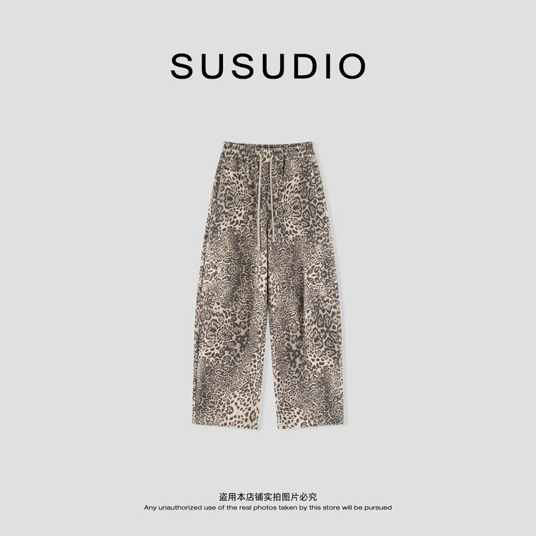 SUSUDIO 100棉 早秋复古水洗做旧豹纹松紧腰弯刀休闲卫裤 E5003
