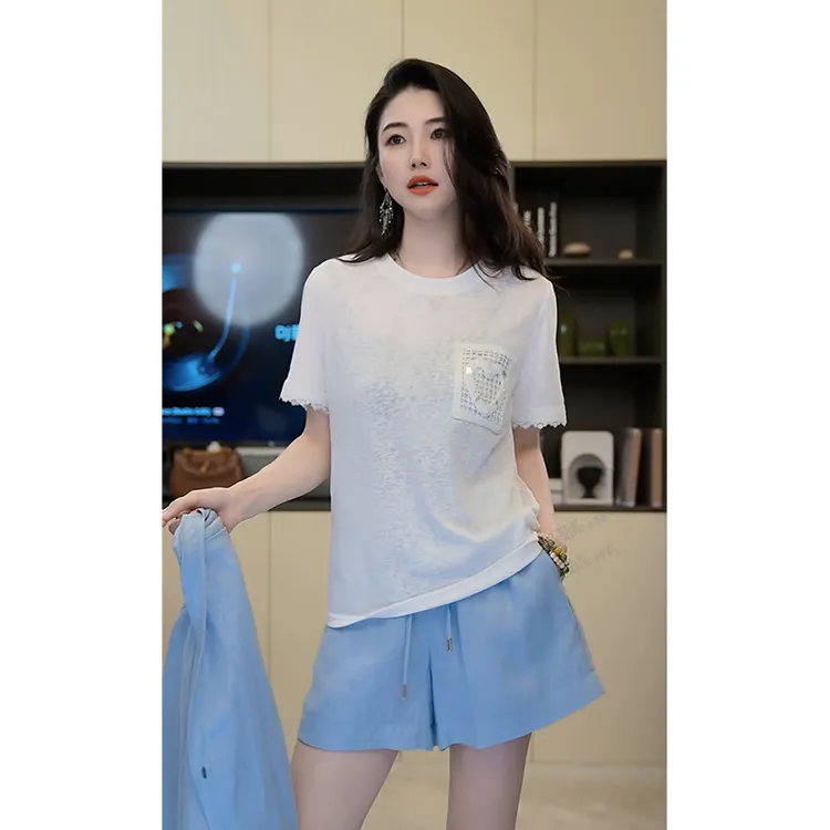 小乖逃X圆领爱心单口袋白色T恤蕾丝边袖子黑色T恤绣花上衣S25366