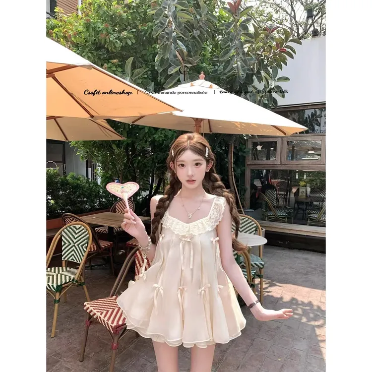  椰香浮云 奶油黄蝴蝶结蕾丝花边蓬蓬无袖上衣+高腰短裤两件套