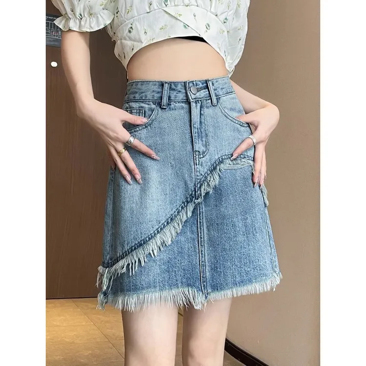 牛仔半身裙女夏季薄款2025新款高腰设计感毛边流苏a字包臀短裙子