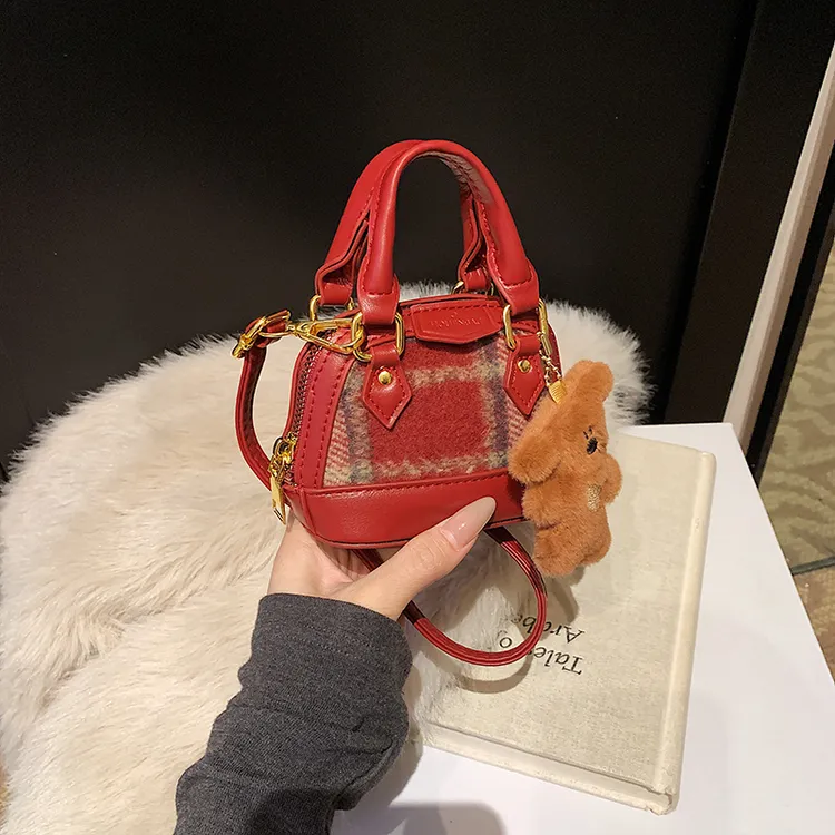 女童新年挎包压岁钱拜年儿童包女公主手提贝壳包小女孩配饰斜挎包