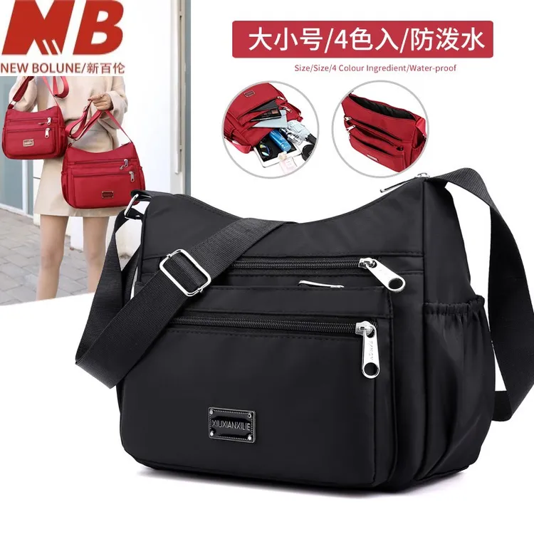 新百伦【万达撤柜】帆布包女2025新款牛津布单肩斜挎包中老年大容