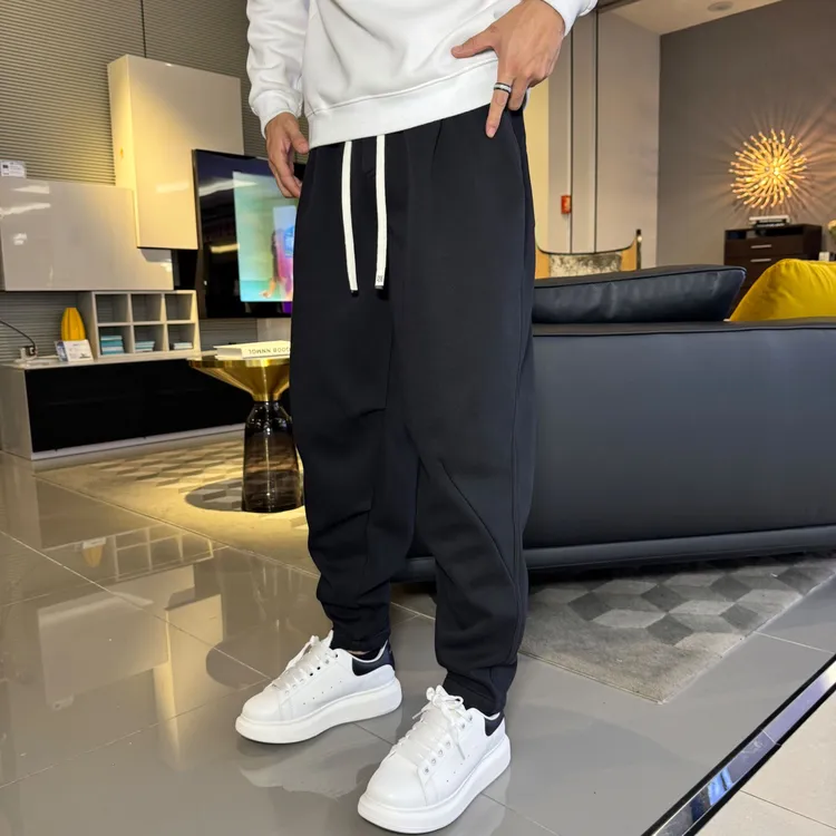 秋冬季爆款韩版休闲裤青年男士百搭松紧腰哈伦裤帅气掐折束脚裤子