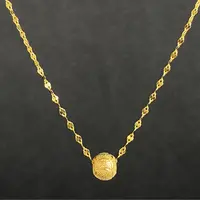 坠链均足银 足银999.9 45厘米金色嘴唇项链+6N路路通珠精致气质