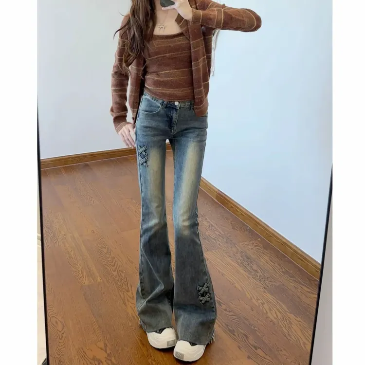 高腰毛边微喇牛仔裤女爆款2026新款复古显瘦设计感弹力马蹄喇叭裤