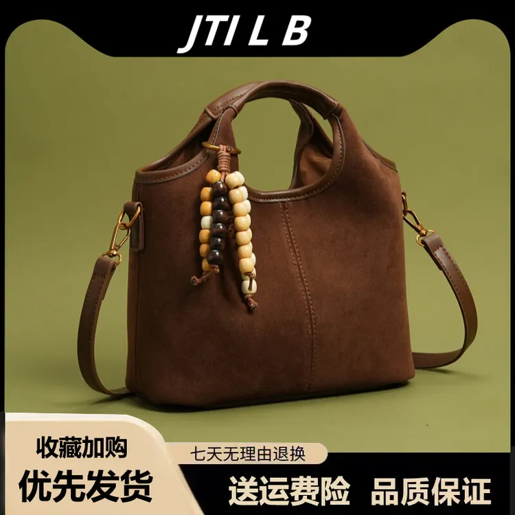 咖色手提水桶包包女2025新款高端大气高级感轻奢小众斜挎菜篮子包