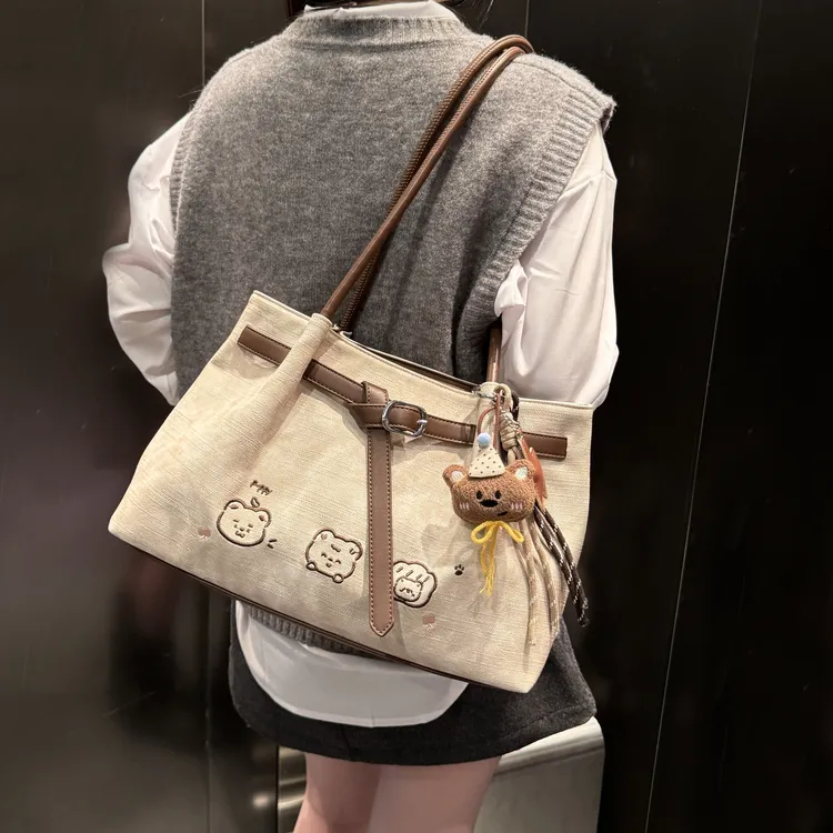 艾米兔女包2026新款休闲日常洋气质感通勤时尚简约百搭刺绣单肩包