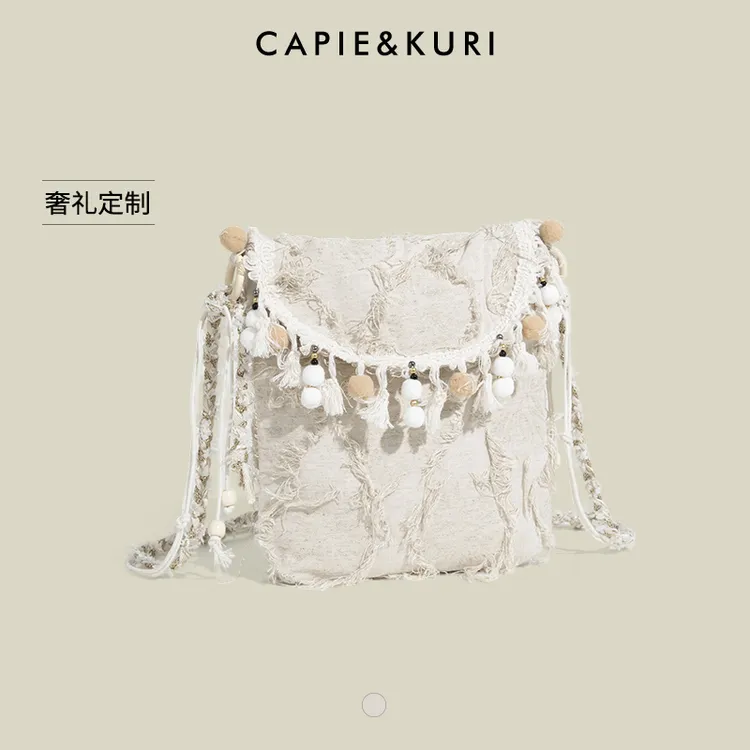CAPIE&KURI新中式串珠流苏帆布包女2025新款文艺度假风单肩斜挎包