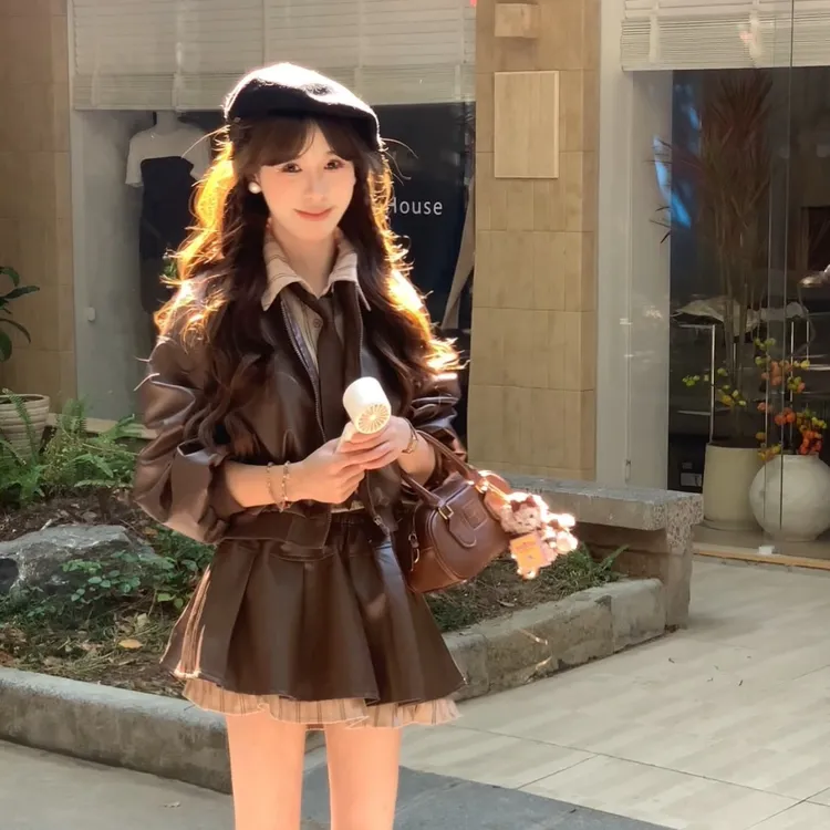 秋冬季设计感拼接衬衫皮衣夹克开衫外套+百褶半身裙+领带套装