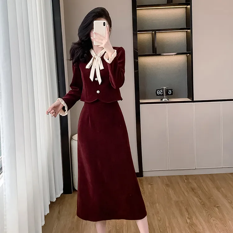 黑色气质秋冬新款时尚荷叶边系带蝴蝶结减龄显瘦长款两件套装裙女