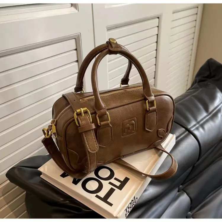 小众休闲设计时尚手提斜跨百搭保龄球女包韩系个性轻奢大学生女包