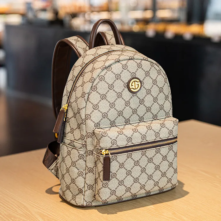 GELANDAI戈兰黛年新款百搭大容量多隔层多功能防盗双肩背包