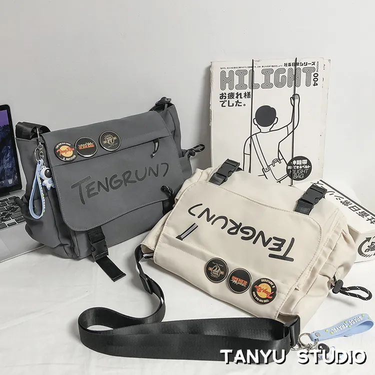 探屿休闲潮流男士单肩斜挎包包新款男女潮牌新款大学生上课邮差包