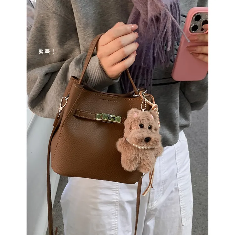 韩系包包女款爆款2025新款秋冬复古时尚手提水桶包小众百搭斜挎包