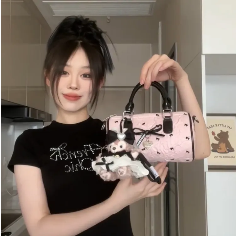 夏天超火粉色蝴蝶结手提枕头包包女包2025新款高级感芭蕾风斜挎包