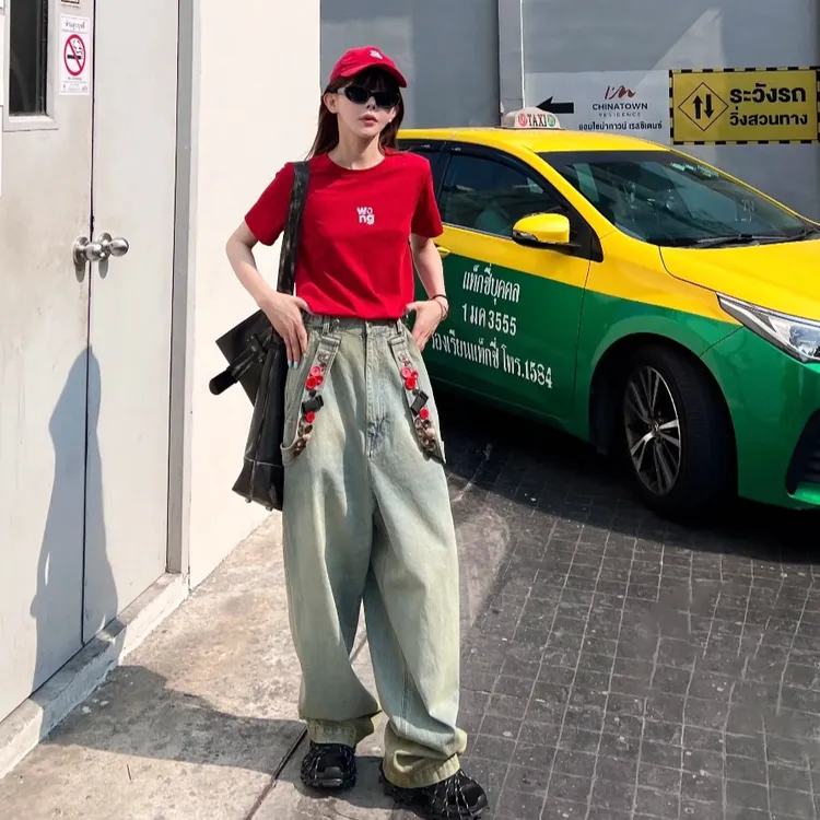 芙沿蓝色多扣子牛仔背带裤女2025年新款美式复古设计感宽松休闲裤