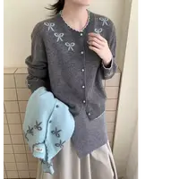 百搭蝴蝶结波浪领上衣女显瘦毛衣秋季宽松圆领针织开衫