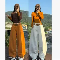 冬季新款韩系加绒保暖牛仔拼接宽松设计感显瘦弯刀裤B3105/3106 