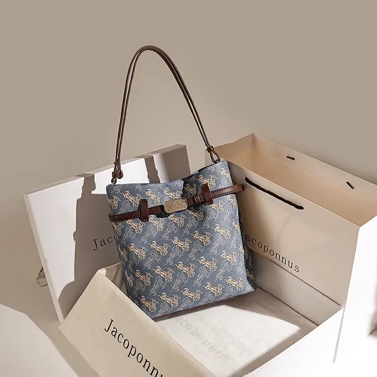 雅各邦真皮老花水桶包包女款爆款2025新款百搭单肩斜挎上班专用包