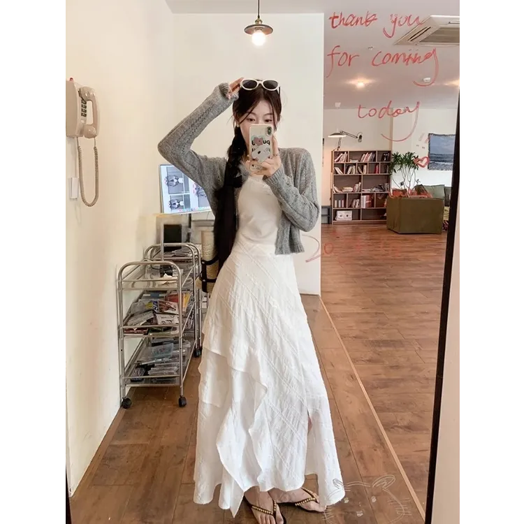 白色不规则荷叶边侧开叉半身裙女新款高腰显瘦气质百搭长裙子