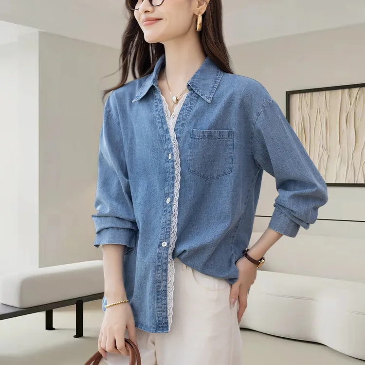 蓝色翻领牛仔衬衫女秋季2025新款时尚宽松设计感拼接蕾丝花边上衣