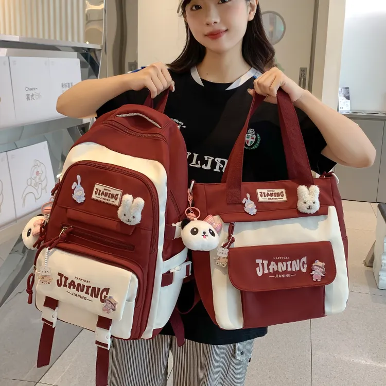 减负护脊大容量中学生初中生书包女高中生女生小学生双肩背包潮