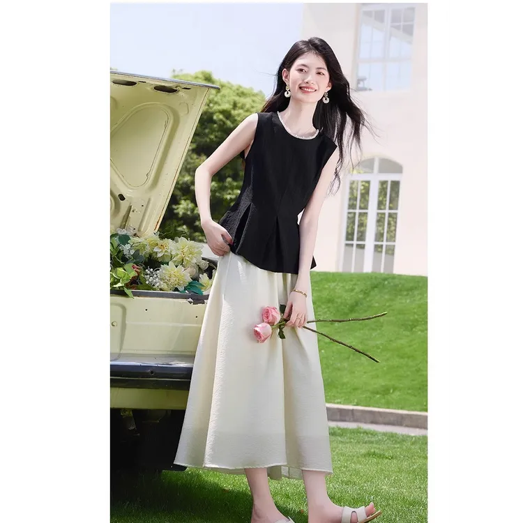 〈纪朵研〉1092高级感温柔风套装女夏气质上衣洋气显瘦半身裙两件套