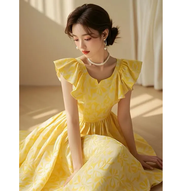 夏季长裙气质高级感小众设计茶歇法式绝美黄色印花小飞袖连衣裙女