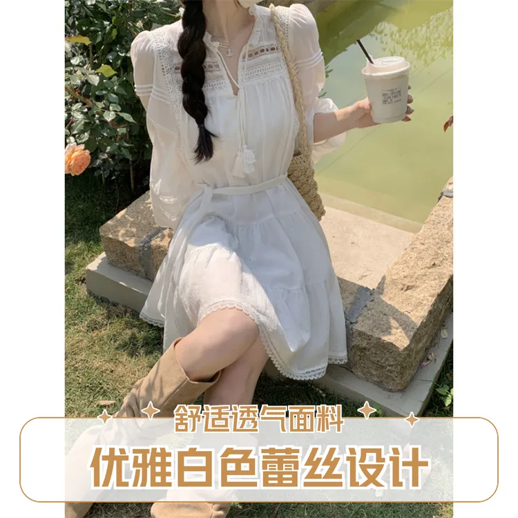 度假裙夏季2025年新款法式镂空蕾丝拼接连衣裙女直筒气质白色裙子