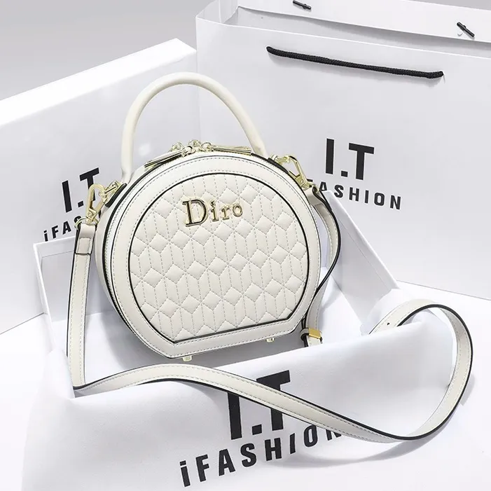 香港品牌正品2025真皮高级时尚轻奢单肩斜挎包小圆包女宽带圆饼包