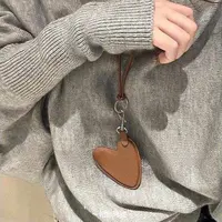 合金皮质项链 爱心挂绳小包项链韩系百搭可爱秋冬挂脖毛衣链W10