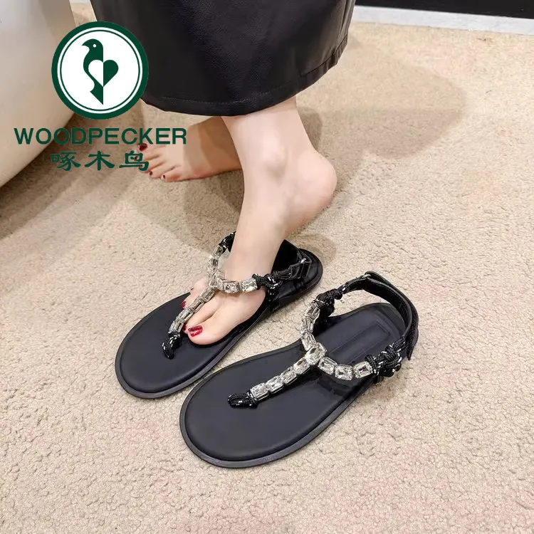 啄木鸟女2025夏新款波西米亚风水钻编绳夹趾魔术贴平底沙滩凉鞋