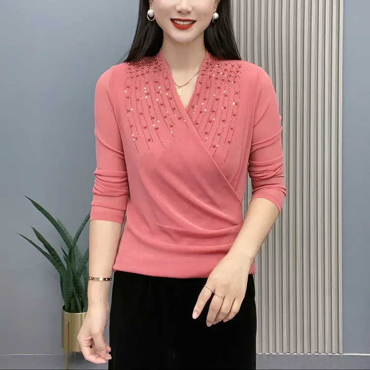春季新款时尚洋气长袖显瘦减龄弹力网纱交叉领钉珠纯色休闲上衣女