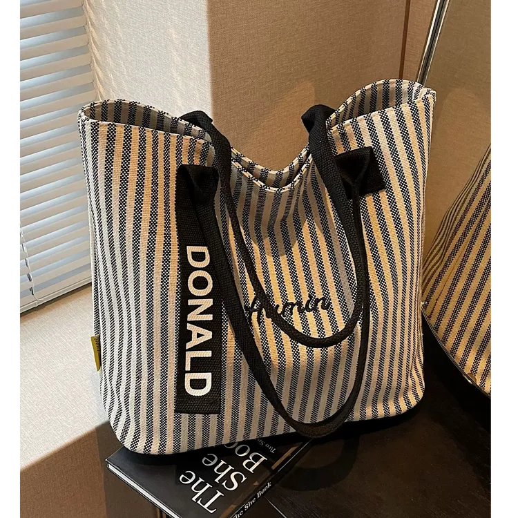 2025夏季新款大容量条纹帆布包包女上课手提袋韩系单肩通勤托特包