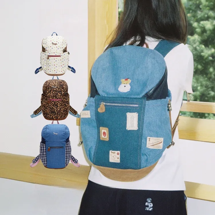 Tagi.面包包休闲大容量背包肩带可调节旅行通勤双肩包