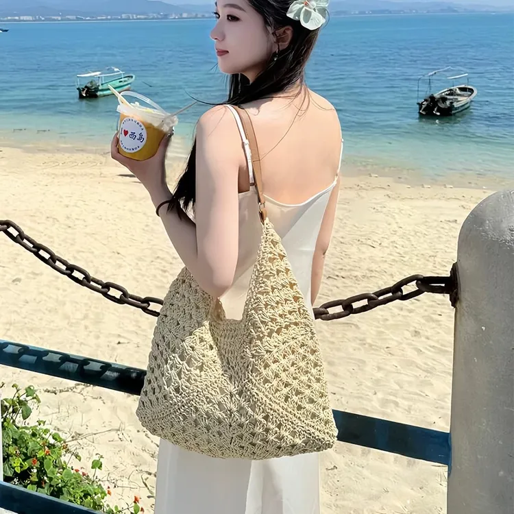 海边沙滩度假草编包包女式2026新款夏季轻奢小众高级感单肩编织包