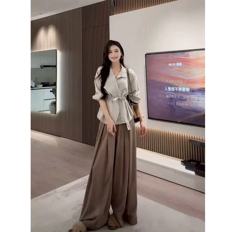 秋装女款爆款2025新款韩系设计感不规则v领长袖衬衫阔腿长裤套装