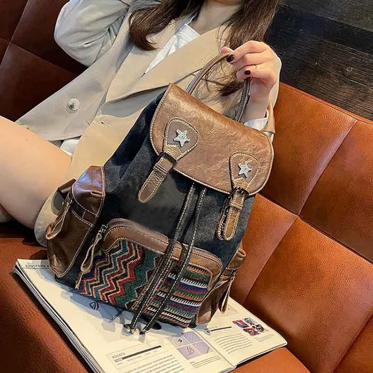新款2025时尚撞色刺绣牛仔布配真皮双肩包女包大容量背包旅行包包