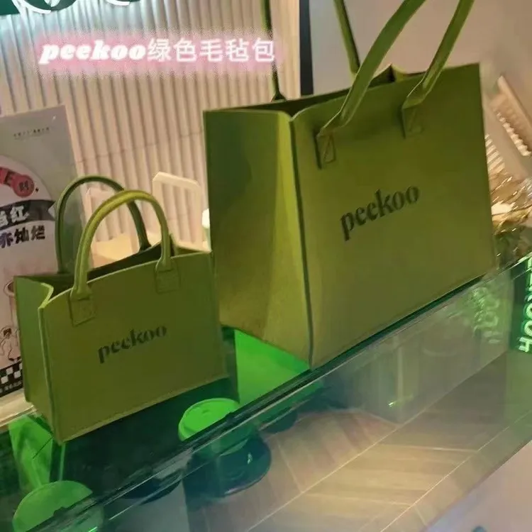 斜挎包单肩包毛毡手提包购物袋手拿简约字母百搭包网红收纳包女包