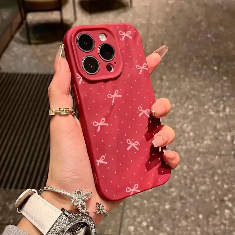 粉色波点蝴蝶结适用iPhone16褶皱手机壳苹果14promax简约1213个性