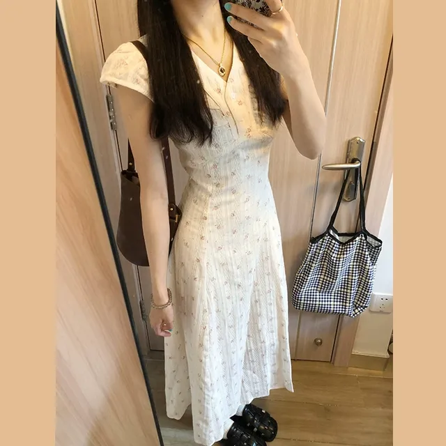 法式度假风白色v领碎花连衣裙子女夏季2025新款爆款气质绝美长裙