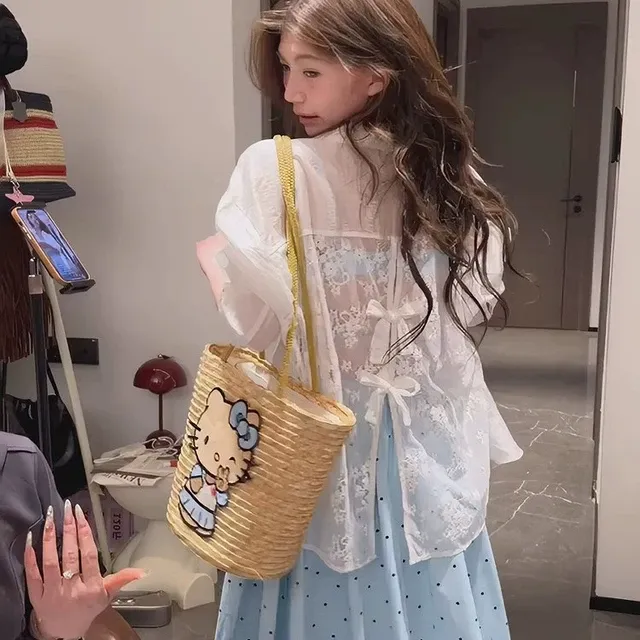 蝴蝶结后背镂空钩花长袖衬衣女夏季时尚减龄单排扣微透防晒衣开衫