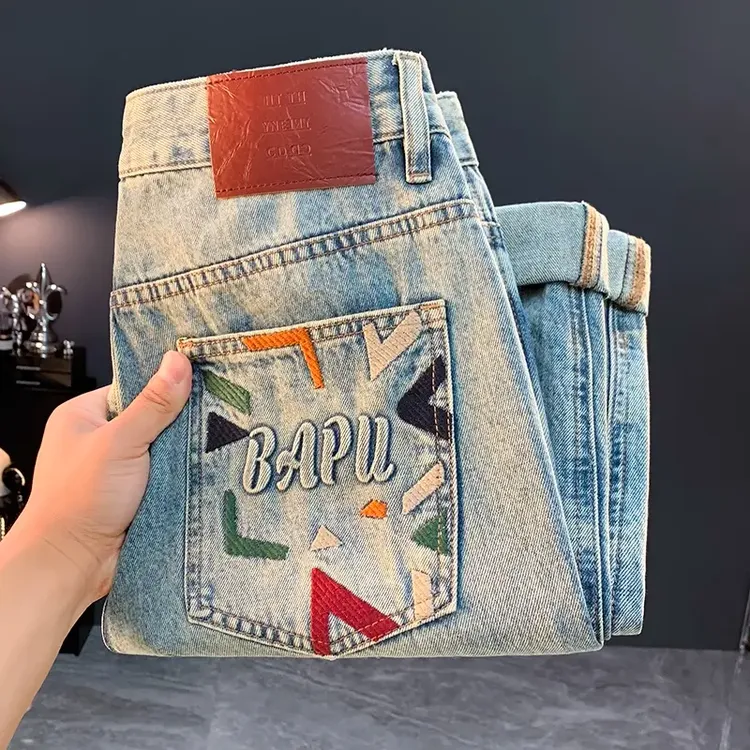 夏季休闲潮牌牛仔裤男2025新款宽松显瘦哈伦裤中腰绣花痞帅小脚裤