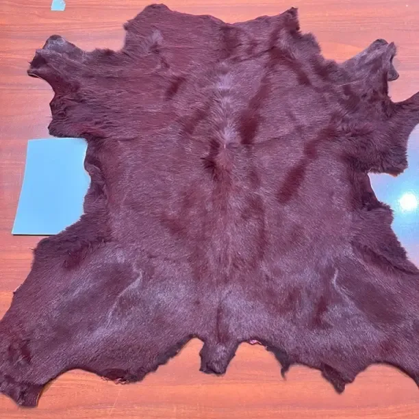 意大利胎牛皮酒红色皮毛一体轻奢毯高级原皮舒适保暖居家装饰毯