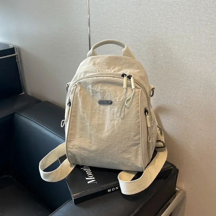 新款大容量通勤旅行双肩包单肩手提包包女轻便牛津布背包
