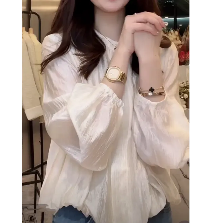 设计感纽扣纯色圆领衬衫女2025春季爆款洋气优雅风外穿长袖衬衣