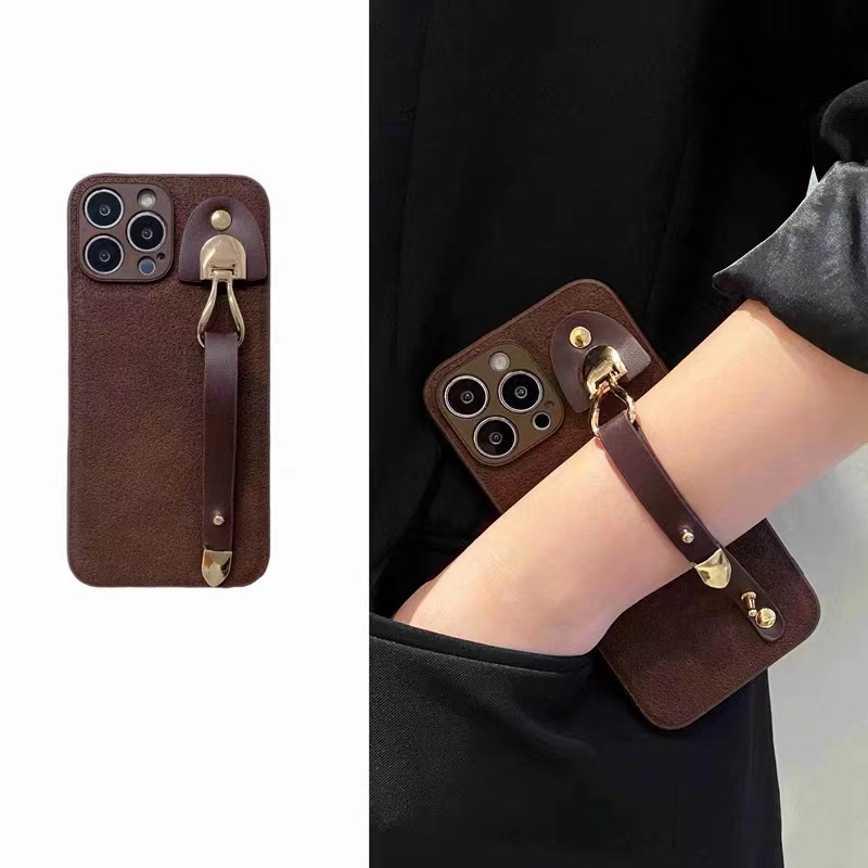 复古月坑纹腕带iphone15手机壳苹果14promax皮质13高级12防摔11女