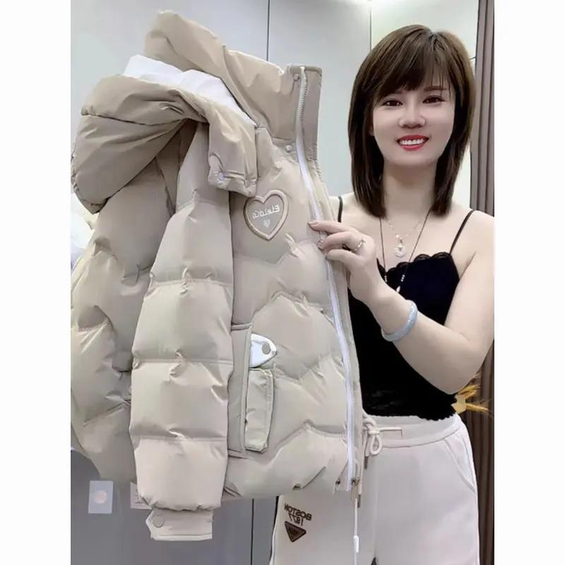 羽绒服女加厚女士冬季新款亮皮免洗棉袄连帽大码时尚百搭外