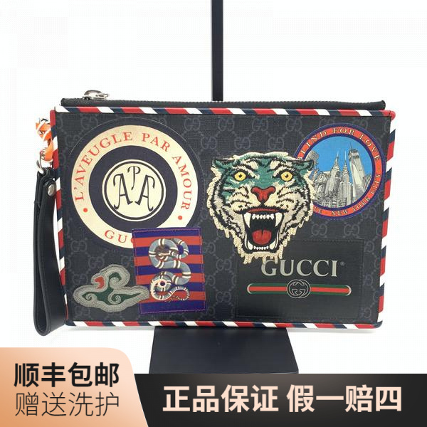 95新 GUCCI/古驰  古驰黑老花徽章手拿包 /10018081 男士休闲奢侈